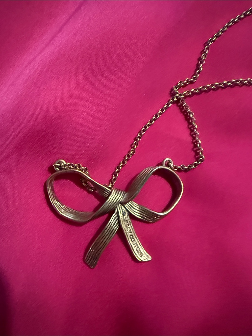 Juicy Couture Gold Bow Pendant Necklace - Elegant Ribbon Design